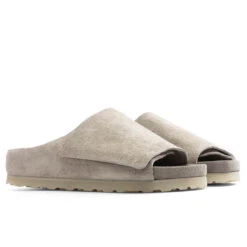 Fear Of God X Birkenstock The Los Feliz Suede - Taupe -Shoe Series Store Fear of God x Birkenstock The Los Feliz Suede Taupe 1024780 TAU 01 21 23 Feature KN 7