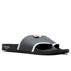 Rubber Pool Slide - Dark Grey 8 Rubber Pool Slide - Dark Grey -Shoe Series Store Thom Browne Rubber Pool Slide Dark Grey MFL054A 05690 025 08 30 22 Feature JORDAN 2