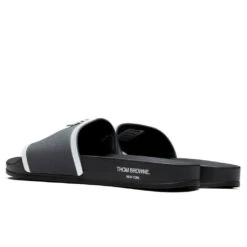 Rubber Pool Slide - Dark Grey 9 Rubber Pool Slide - Dark Grey -Shoe Series Store Thom Browne Rubber Pool Slide Dark Grey MFL054A 05690 025 08 30 22 Feature JORDAN 3